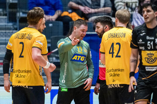 goalkeeper Andreas Palicka of Sweden in a conversation with