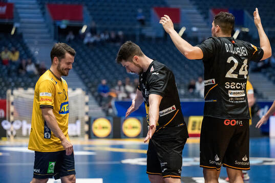 Sebastian Karlsson of Sweden and Alex Dujshebaev and Daniel