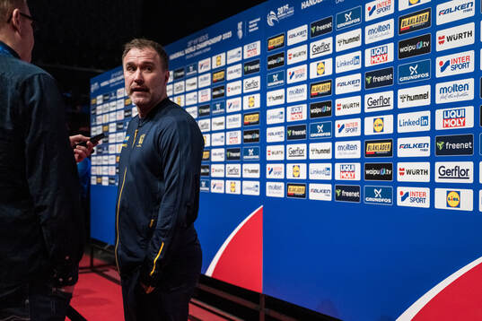 Head coach Michael Apelgren of Sweden in mixed zone