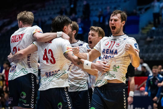 Simen Ulstad Lyse and Petter Øverby of Norway celebrate