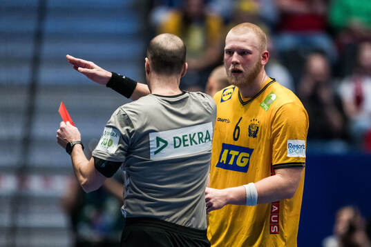 Felix Möller of Sweden reacts to receiving a red card