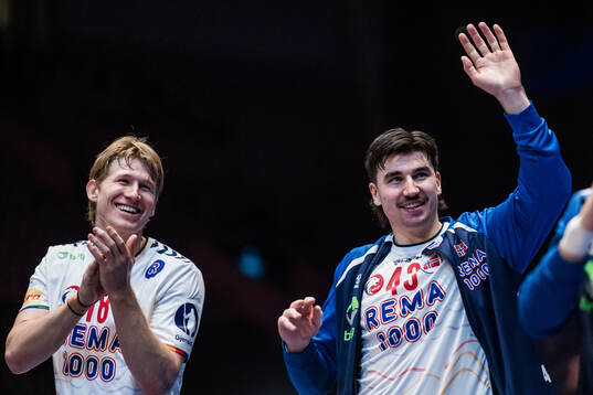 William Otto Aar and Simen Ulstad Lyse of Norway celebrate