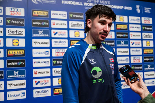 Simen Ulstad Lyse of Norway in mixed zone
