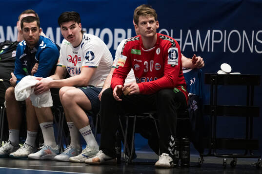 Simen Ulstad Lyse and goalkeeper Torbjørn Bergerud of