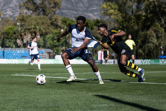 Michael Akoto of AGF Århus and Alexander Fesshaie of AIK