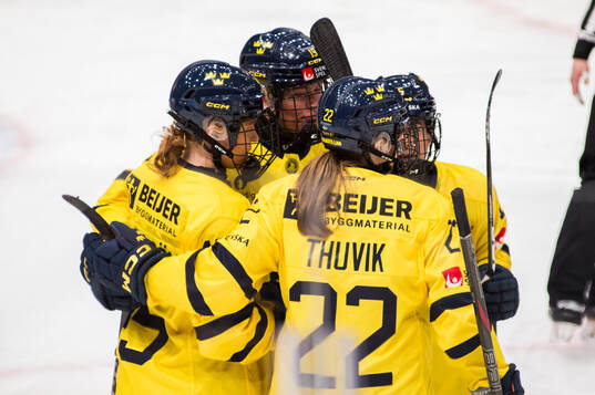 Sara Hjalmarsson of Sweden celebrate with teammates