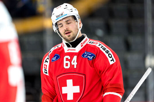 Marco Muller of Switzerland looks dejected