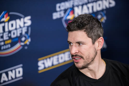 Sidney Crosby of Canada is being interviewed by media