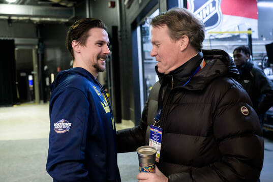 Erik Karlsson of Sweden hugs Johan Garpenlöv, former