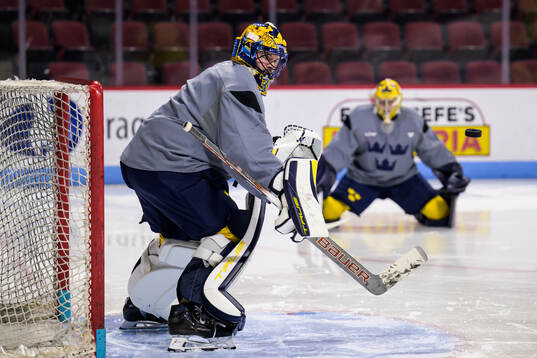Goaltenders Samuel Ersson and Filip Gustavsson of Sweden at