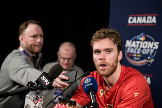 Connor McDavid of Canada is being interviewed by media