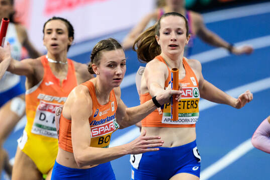 Femke Bol and Cathelijn Peeters of Netherlands compete in
