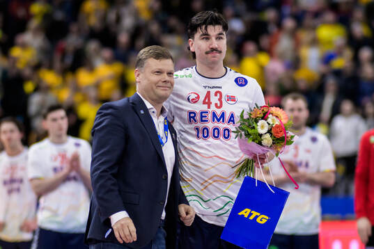 Simen Ulstad Lyse of Norway is awarded player of the match