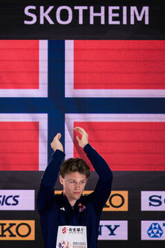 Sander Skotheim of Norway celebrates at the podium