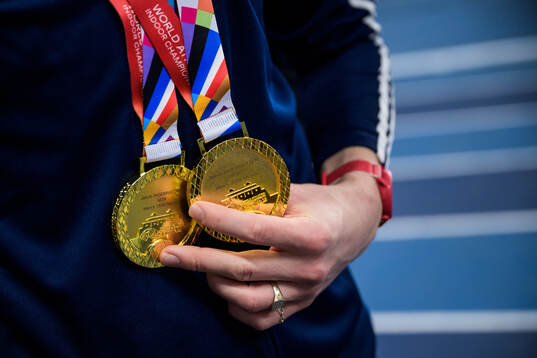 Jakob Asserson Ingebrigtsen of Norway holds his gold medals