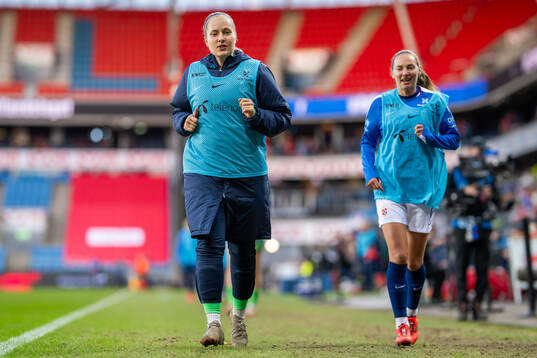 Goalkeeper Aurora Mikalsen and Marit Bratberg Lund of
