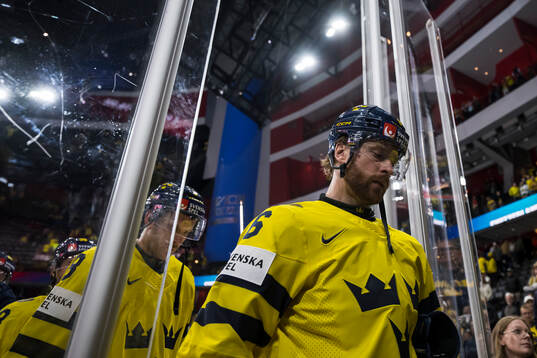 Adam Larsson of Sweden looks dejected