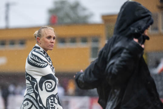 Tilde Johansson of Sweden is wrapped in a blanket while