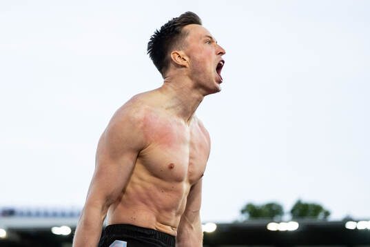 Karsten Warholm of Norway celebrates