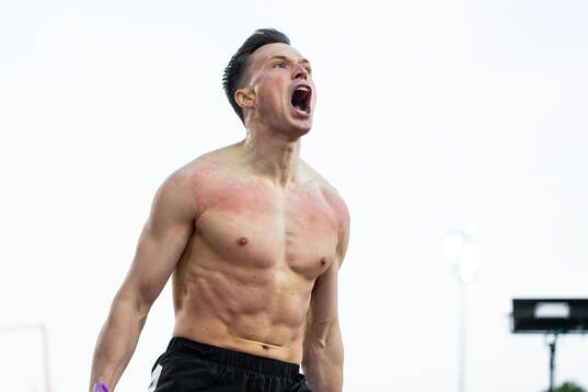 Karsten Warholm of Norway celebrates