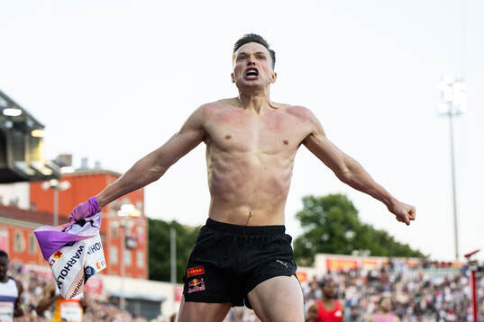 Karsten Warholm of Norway celebrates