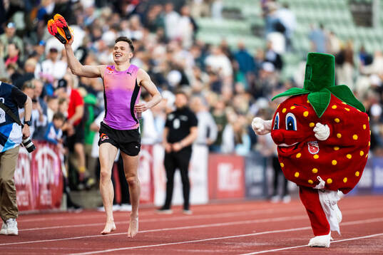 Karsten Warholm of Norway celebrates