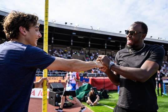 Armand Duplantis of Sweden and Usain Bolt