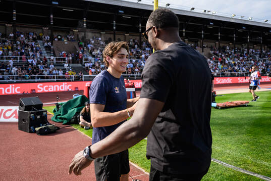 Armand Duplantis of Sweden and Usain Bolt
