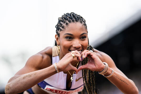 Tara Davis-Woodhall of USA celebrates in women’s long jump