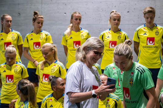 Press officer Rebecka Schelin and goalkeeper Jennifer Falk