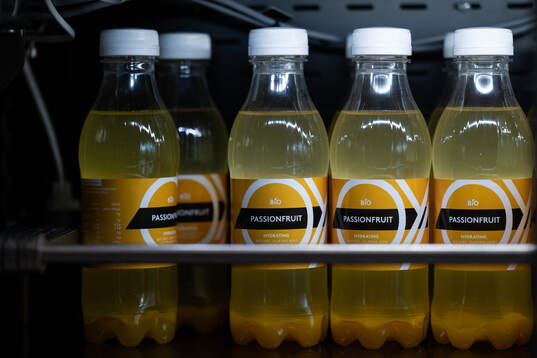 Bottles with hydrating drinks seen at a walk around at OYM