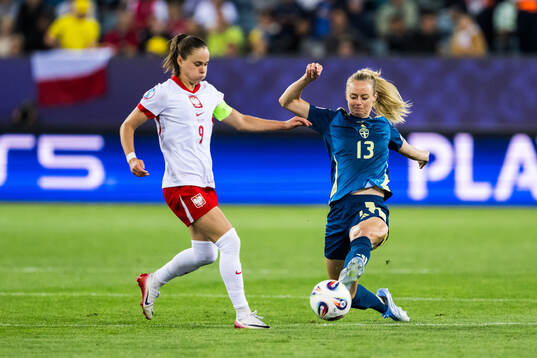 Ewa Pajor of Poland and Amanda Ilestedt of Sweden