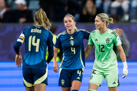 Hanna Lundkvist and goalkeeper Jennifer Falk of Sweden