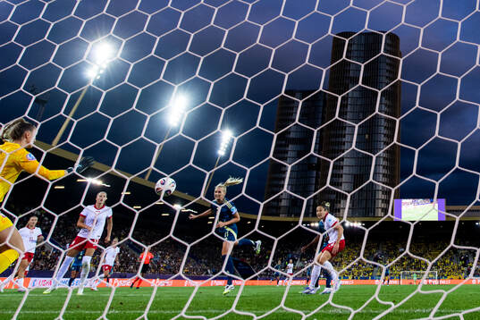 Stina Blackstenius of Sweden scores 0-1 behind goalkeeper