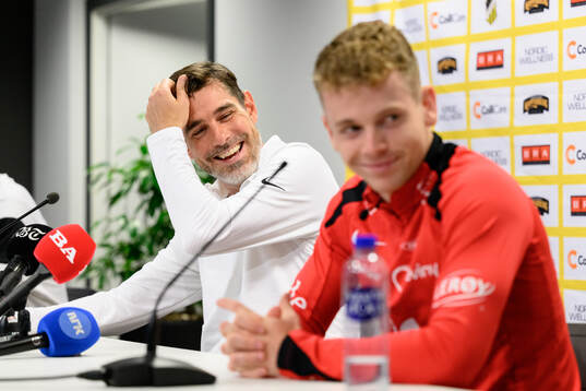 Coach Freyr Alexandersson at a press conference