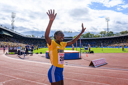 Abeba Aregawi of Sweden celebrates