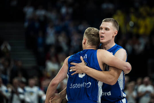 Sasu Salin and Elias Valtonen of Finland celebrate