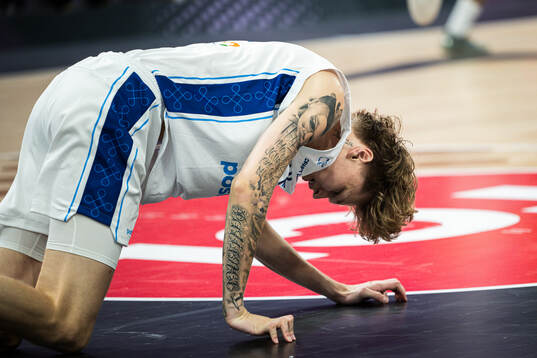 Miikka Muurinen of Finland in pain