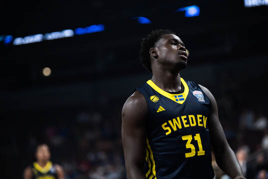 Barra Njie of Sweden looks dejected