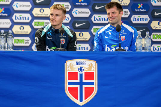 Martin Ødegaard and press officer Morten Morisbak