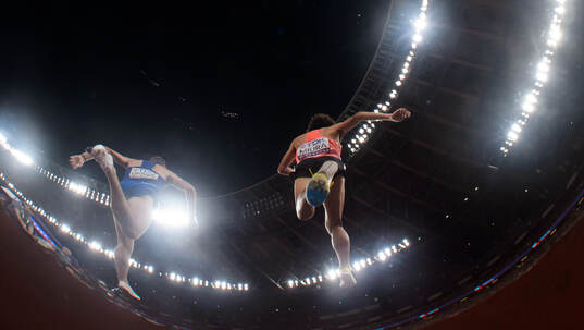 Isaac Updike of USA and Ryuji Miura of Japan compete in