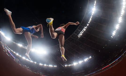 Isaac Updike of USA and Ryuji Miura of Japan compete in