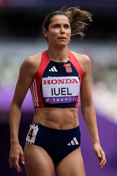 Amalie Iuel of Norway in women's 400 meters hurdles