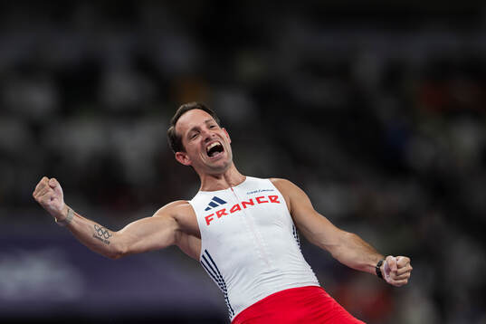 Renaud Lavillenie of France celebrates when competing in