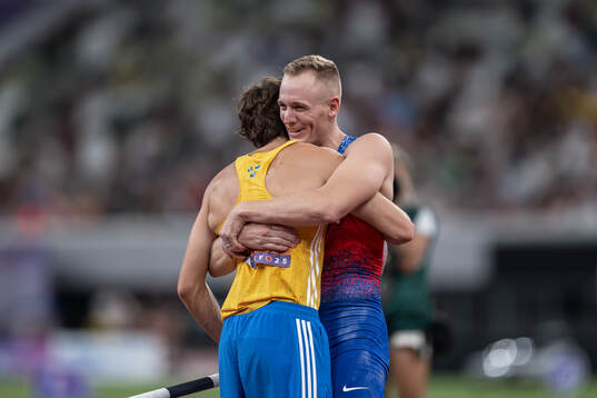 Armand Duplantis and Sam Kendricks of USA celebrate when