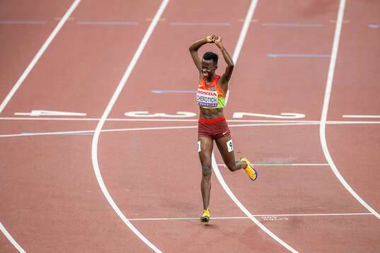 Faith Cherotich of Kenya celebrates winning women’s 3000