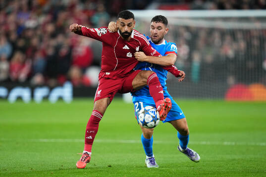 Mohammed Salah of Liverpool and Javier Galán of Atletico