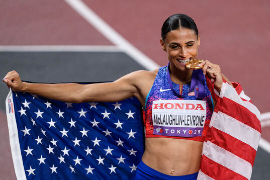Sydney McLaughlin-Levrone of USA celebrates with her gold