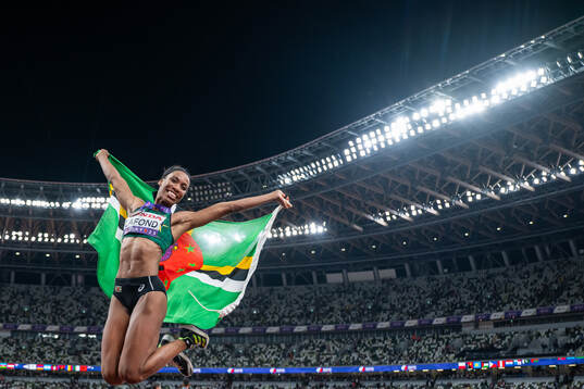 Thea Lafond of Dominica celebrates