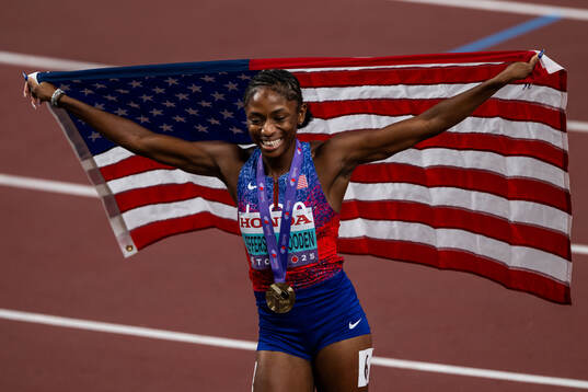 Melissa Jefferson-Wooden of USA celebrates winning in